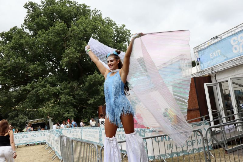 Festival staff stilt walker summer leeds festival